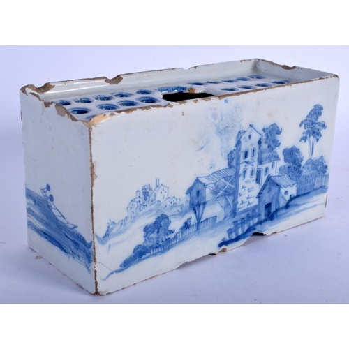 2344 - AN 18TH CENTURY EUROPEAN BLUE AND WHITE DELFT FAIENCE GLAZED FLOWER BRICK painted with landscapes. 1... 