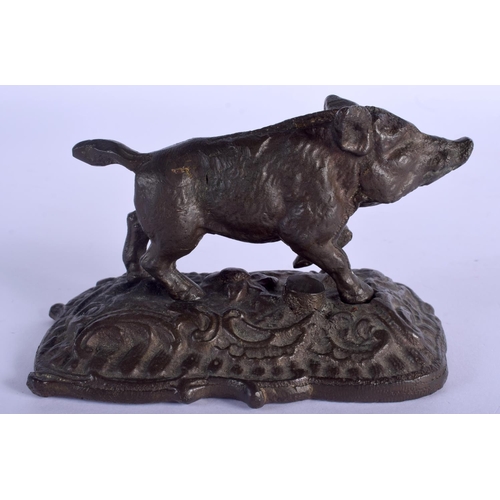 2345 - A 19TH CENTURY BRONZE FIGURE OF A ROAMING WILD HOG modelled upon a naturalistic base. 12 cm x 8 cm.