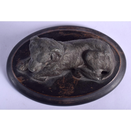 2349 - A 19TH CENTURY FRENCH SPELTER FIGURE OF A HOUND modelled recumbent. 12 cm wide.