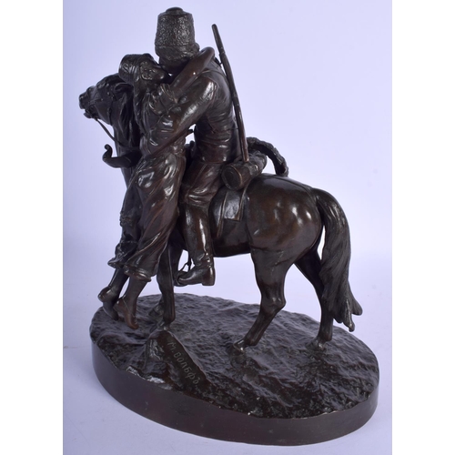 2359 - A 19TH CENTURY RUSSIAN BRONZE FIGURE OF A COSSACK AND FEMALE modelled upon a naturalistic base. 27 c... 