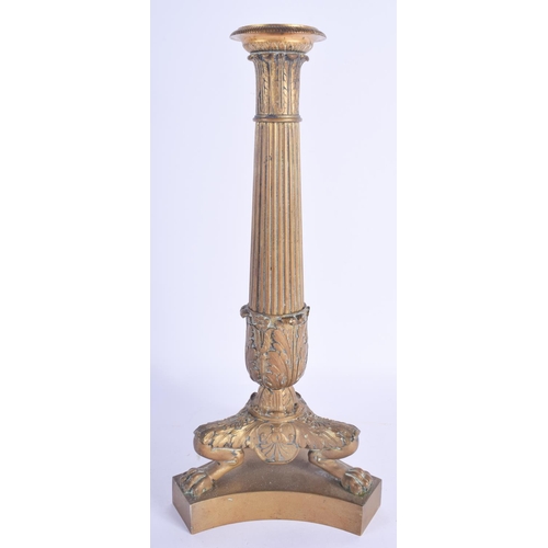 2364 - A 19TH CENTURY FRENCH BRONZE FIGURE OF A CANDLESTICK modelled upon a triangular base. 36 cm high.