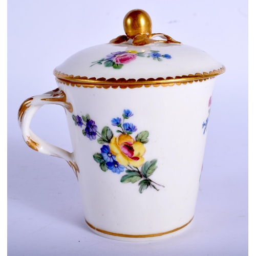 237 - Sevres tapering cup with entwined handle and cover and stand painted with flowers date code for 1780... 