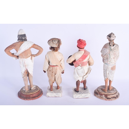 2373 - FOUR LARGE 19TH CENTURY INDIAN BOMBAY COMPANY SCHOOL TERRACOTTA FIGURES in various forms. Largest 32... 