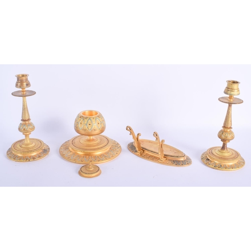 2395 - A LATE 19TH CENTURY FRENCH GILT METAL DESK SET jewelled with turquoise and garnets. Largest 15 cm wi... 