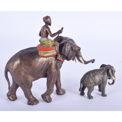 2418 - A 19TH CENTURY AUSTRIAN COLD PAINTED BRONZE ELEPHANT together with a small bronze elephant. Largest ... 