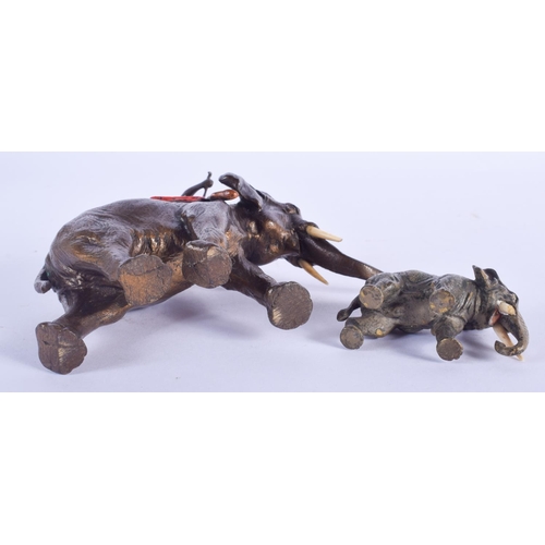 2418 - A 19TH CENTURY AUSTRIAN COLD PAINTED BRONZE ELEPHANT together with a small bronze elephant. Largest ... 