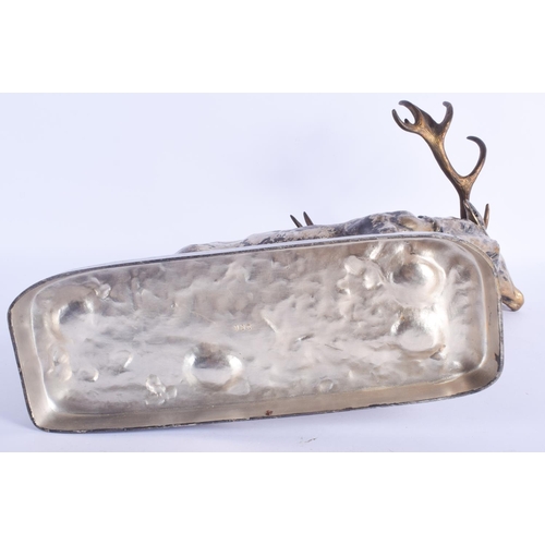 2424 - A LARGE ANTIQUE SILVERED BRASS FIGURE OF A ROAMING STAG modelled upon a rectangular base. 33 cm x 34... 