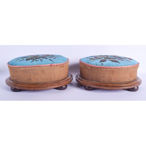 2433 - A PAIR OF VICTORIAN BEADWORK STOOLS. 30 cm diameter.