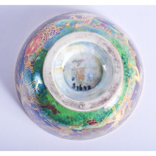 2453 - A WEDGWOOD FAIRYLAND LUSTRE BOWL painted with whimsical figures. 9 cm diameter.