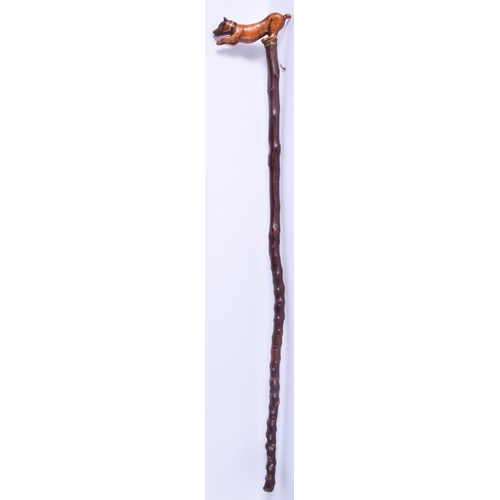 2459 - AN ANTIQUE BAVARIAN BLACK FOREST DOG WALKING CANE. 90 cm long.