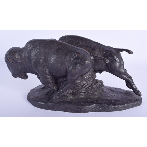 2464 - A VINTAGE CONTINENTAL BRONZE FIGURE OF TWO BUFFALO by Boulton. 28 cm x 15 cm.