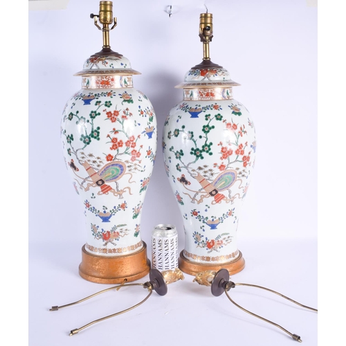 2487 - A LARGE PAIR OF 19TH CENTURY SAMSONS OF PARIS VASES AND COVERS converted to lamps. Vase 41 cm high.