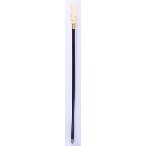 2490 - A CONTINENTAL CARVED BONE WALKING CANE. 96 cm long.