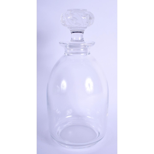 25 - A FRENCH LALIQUE GLASS DECANTER AND STOPPER. 24 cm high.