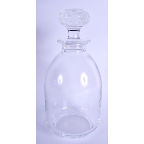 25 - A FRENCH LALIQUE GLASS DECANTER AND STOPPER. 24 cm high.