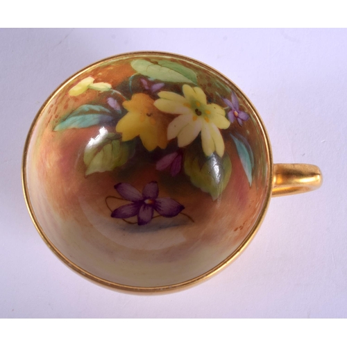 265 - Royal Worcester miniature teacup and saucer painted with primroses by Miss Twinborrow, saucer signed... 