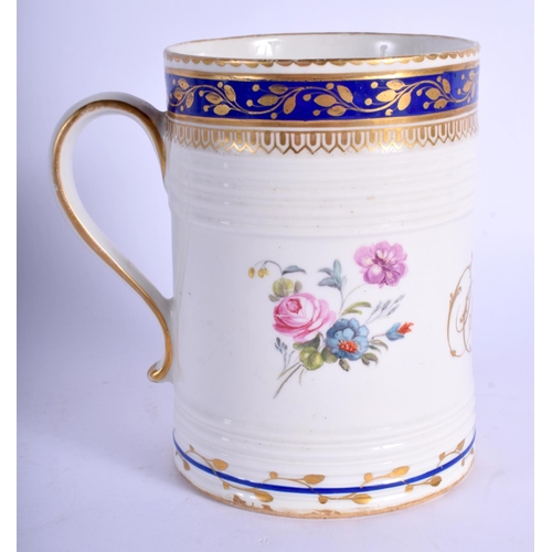 296 - Derby mug moulded with  ribs painted with two sprays of flowers under a Smiths blue border with gil... 