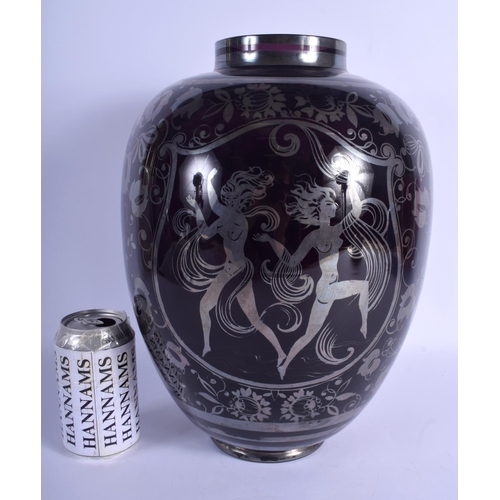 31 - A VERY LARGE HEAVY ART DECO PURPLE SILVER PAINTED GLASS VASE decorated with dancing females in vario... 