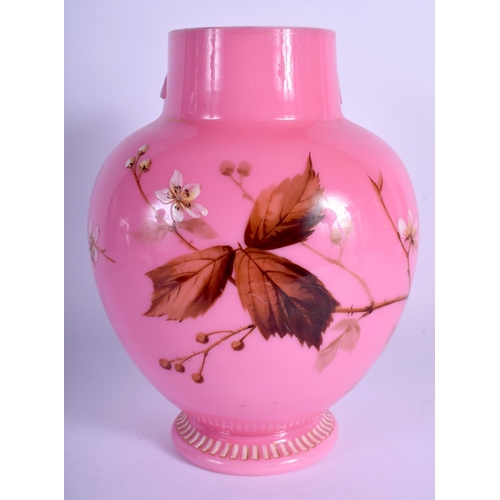 35 - A LATE VICTORIAN/EDWARDIAN PINK OPALINE GLASS VASE enamelled with birds. 21 cm x 13 cm.