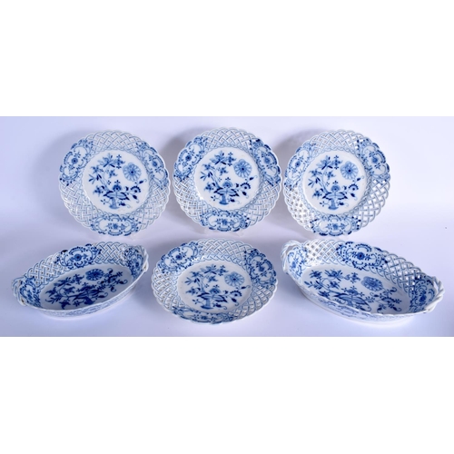 101 - FOUR MEISSEN BLUE AND WHITE PLATES together with two baskets. Largest 29 cm wide. (6)