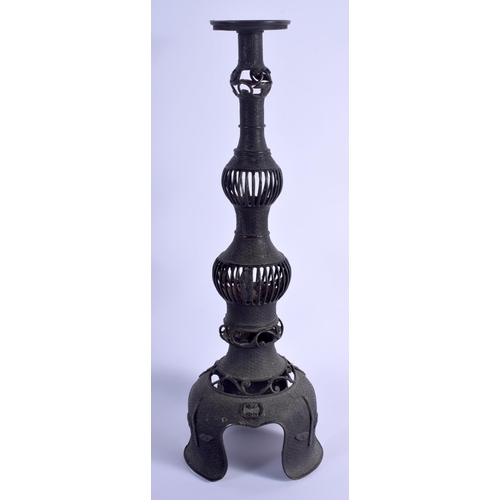 1014 - A LARGE 19TH CENTURY JAPANESE MEIJI PERIOD BRONZE CANDLESTICK with openwork body. 44 cm high.