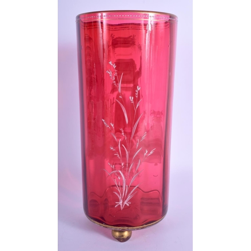 38 - A FINE 19TH CENTURY CRANBERRY GLASS CYLINDRICAL VASE enamelled by Mary Gregory. 29 cm high.