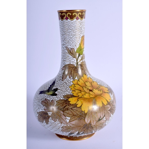 1034 - AN EARLY 20TH CENTURY CHINESE CLOISONNE ENAMEL VASE decorated with birds and flowers. 19 cm high.