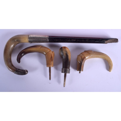 404 - A 19TH CENTURY CONTINENTAL CARVED RHINOCEROS HORN HANDLE together with three other horn handles. Lar... 