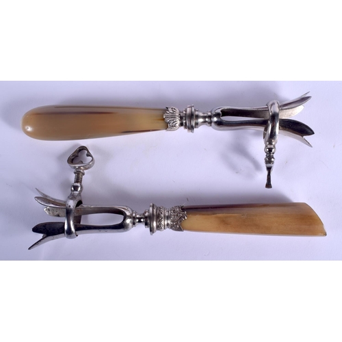 407 - A RARE PAIR OF 19TH CENTURY CARVED RHINOCEROS HORN DRUM STICK HOLDERS one in a fitted case. 18 cm lo... 