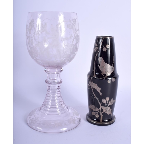 42 - AN EARLY 20TH CENTURY BOHEMIAN GLASS GOBLET together with a silver painted glass vase. Largest 21.5 ... 