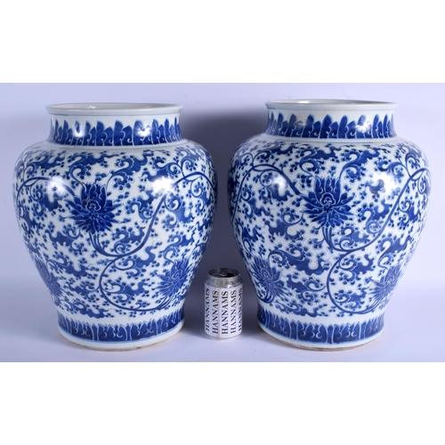 1047 - A LARGE PAIR OF CHINESE BLUE AND WHITE PORCELAIN BALUSTER VASES probably Mid Qing Dynasty, painted w... 