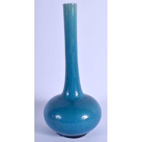 1048 - A 19TH CENTURY JAPANESE TURQUOISE BLUE GLAZED VASE of plain form with narrow neck. 18 cm high.