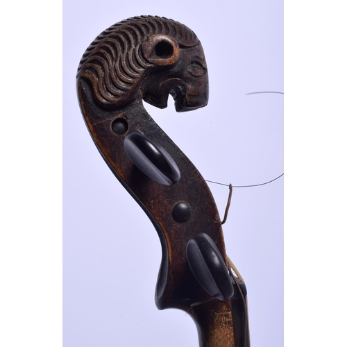 427 - AN ANTIQUE TWO PIECE BACK VIOLIN with animal terminal, together with two bows. 59 cm long.