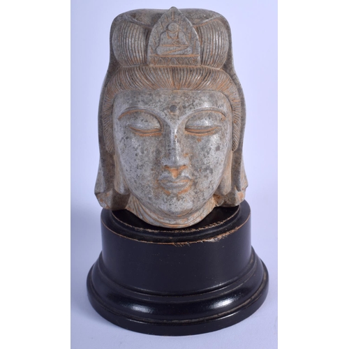 1057 - AN EARLY 20TH CENTURY CHINESE CARVED STONE HEAD OF A BUDDHISTIC DEITY Late Qing/Republic. Stone 11 c... 