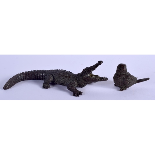 1062 - A JAPANESE BRONZE CROCODILE OKIMONO together with a small bird okimono. Largest 13 cm wide. (2)