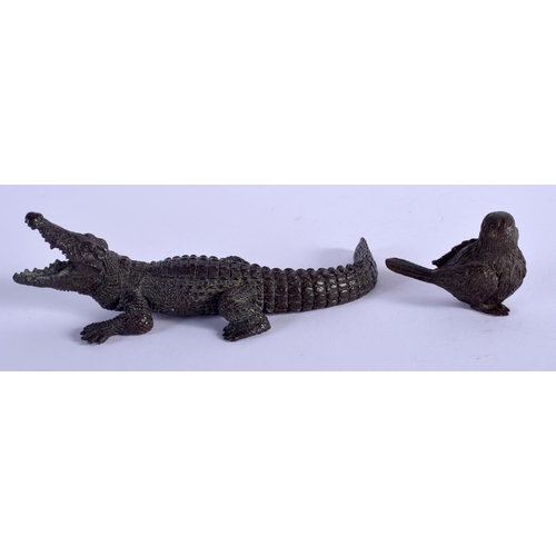 1062 - A JAPANESE BRONZE CROCODILE OKIMONO together with a small bird okimono. Largest 13 cm wide. (2)