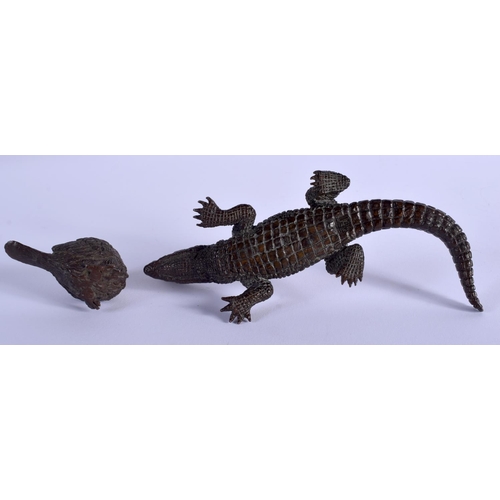 1062 - A JAPANESE BRONZE CROCODILE OKIMONO together with a small bird okimono. Largest 13 cm wide. (2)