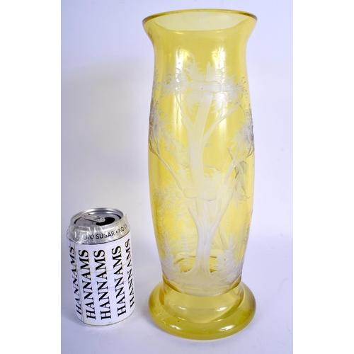 45 - A LARGE BOHEMIAN YELLOW GLASS VASE decorated with birds in flight. 31 cm high.