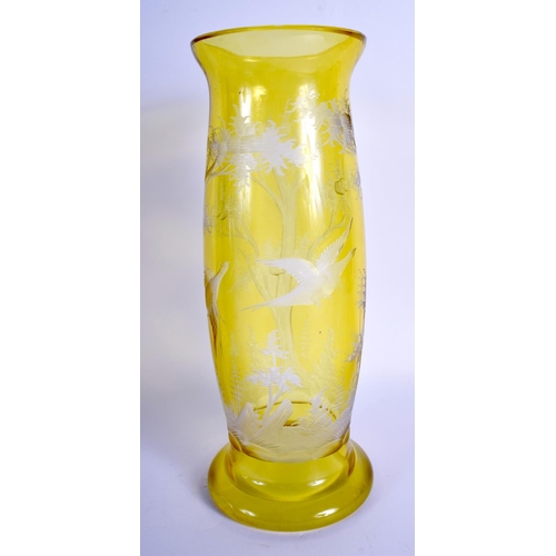 45 - A LARGE BOHEMIAN YELLOW GLASS VASE decorated with birds in flight. 31 cm high.