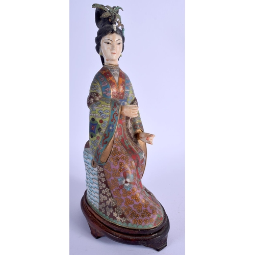 1079 - AN EARLY 20TH CENTURY CHINESE CLOISONNE ENAMEL AND IVORY GUANYIN decorated with motifs. 27 cm high.