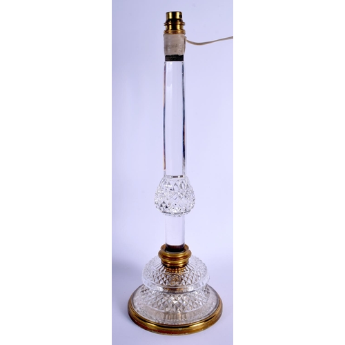 454 - AN ANTIQUE CRYSTAL GLASS LAMP. 46 cm high overall.