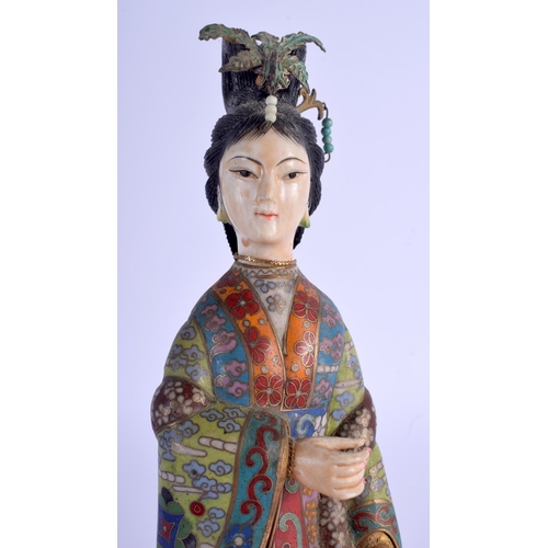 1079 - AN EARLY 20TH CENTURY CHINESE CLOISONNE ENAMEL AND IVORY GUANYIN decorated with motifs. 27 cm high.