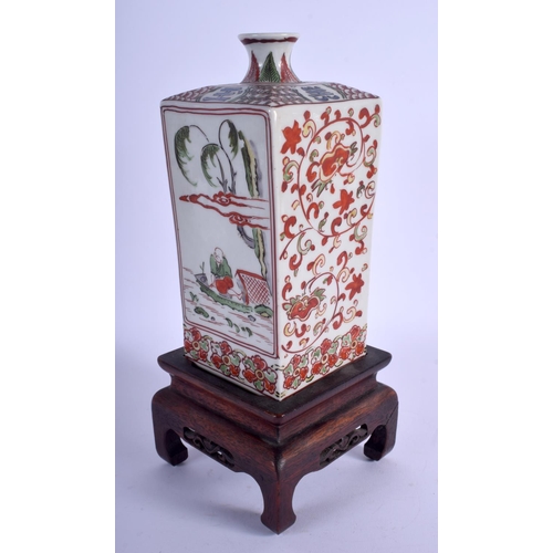 1080 - A RARE 19TH CENTURY JAPANESE MEIJI PERIOD AO KUTANI KAKIEMON SAKE BOTTLE painted with a figure upon ... 