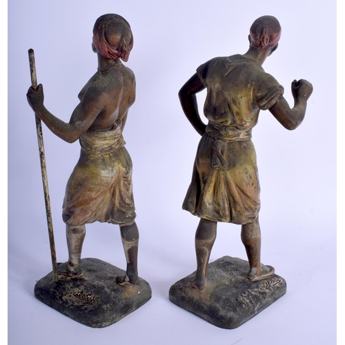 462 - A PAIR OF VICTORIAN SPELTER FIGURES OF TWO MIDDLE EASTERN MALES. 33 cm high.