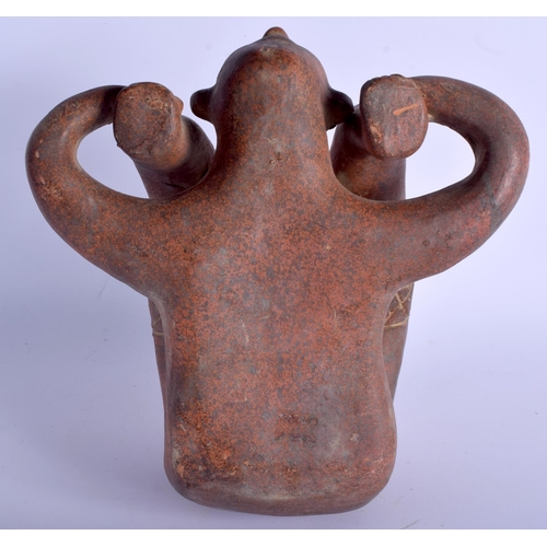 465 - A SOUTH AMERICAN PRE COLUMBIAN POTTERY VESSEL modelled as a male holding his legs. 30 cm x 24 cm.