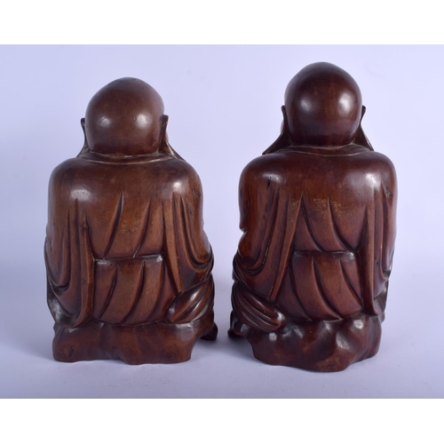 1091 - A PAIR OF 19TH CENTURY CHINESE CARVED HARDWOOD BUDDHA Qing. 24 cm x 10 cm.