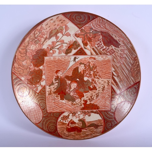 1095 - A 19TH CENTURY JAPANESE MEIJI PERIOD KUTANI PORCELAIN CHARGER painted with immortals. 32 cm diameter... 