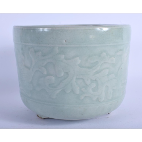 1096 - A 19TH CENTURY CHINESE CELADON PORCELAIN JARDINIERE Qing, decorated with foliage. 18 cm x 13 cm.