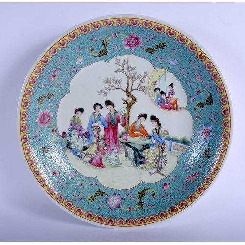 1099 - A LARGE CHINESE REPUBLICAN PERIOD FAMILLE ROSE CHARGER painted with geisha within landscapes. 36 cm ... 