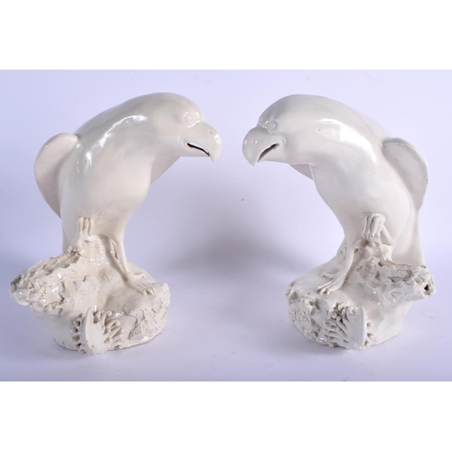 1108 - A PAIR OF 19TH CENTURY CHINESE BLANC DE CHINE PORCELAIN FIGURES OF BIRDS modelled upon naturalistic ... 